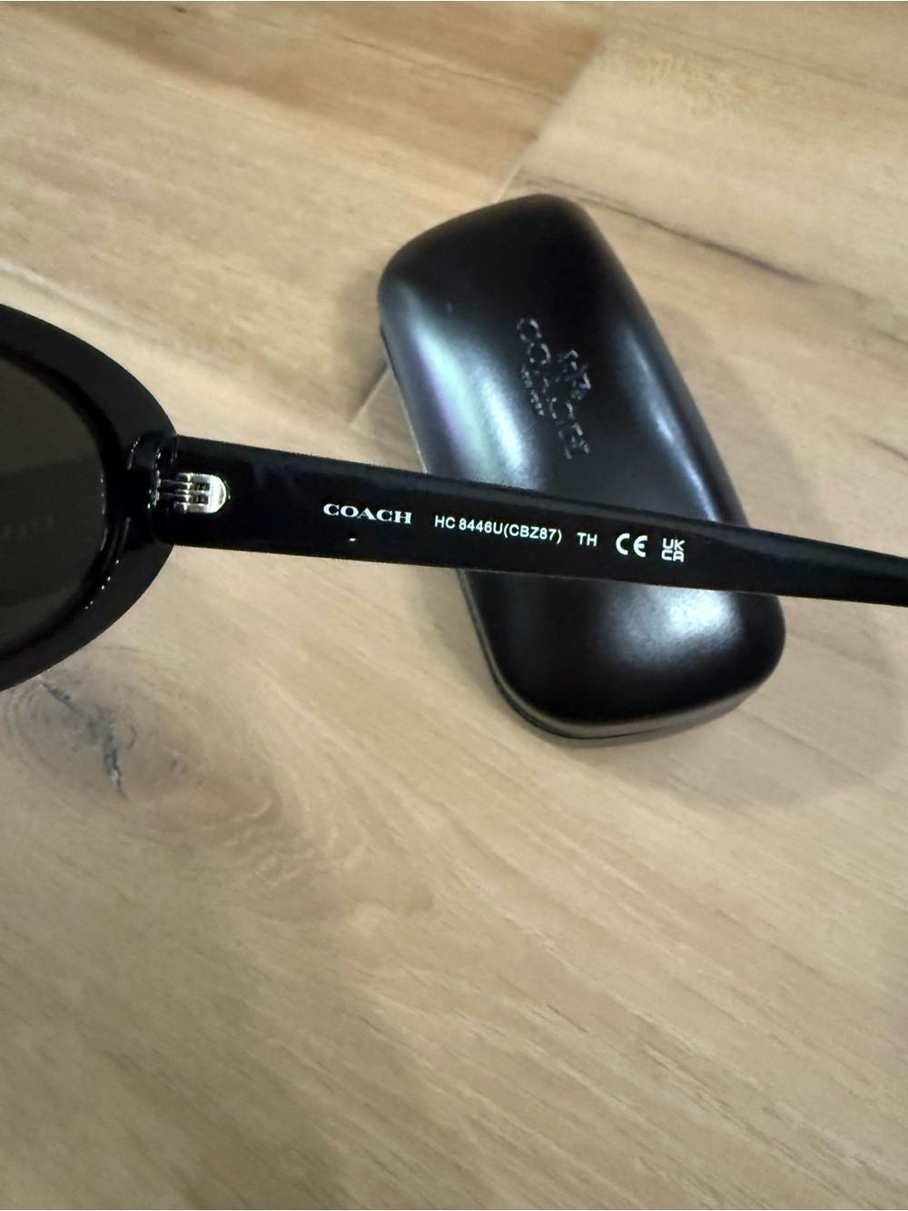 Coach Women's Black Oval Sunglasses with Dark Lenses - Picture 5 of 11